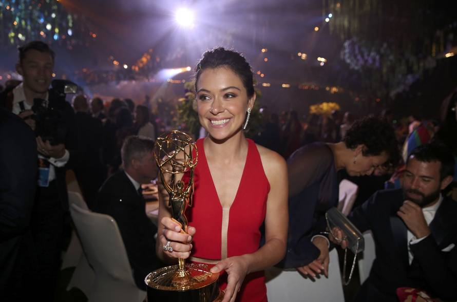 Actress Tatiana Maslany holds her award for Outstanding Lead Actress In A Drama Series as she mingles at the Governors Ball after the 68th Primetime Emmy Awards in Los Angeles