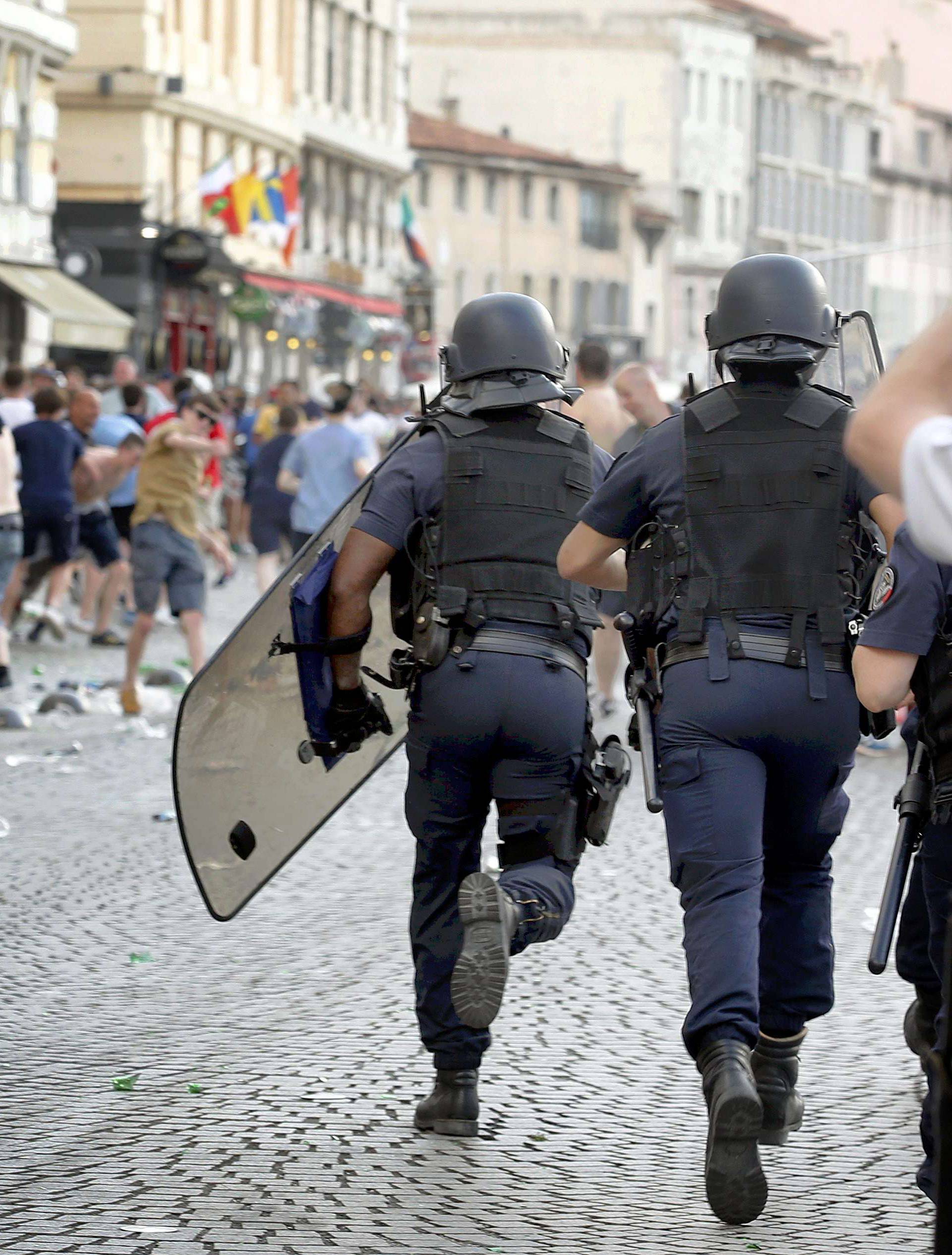 Police chase England fans ahead of England's EURO 2016 match in Marseille