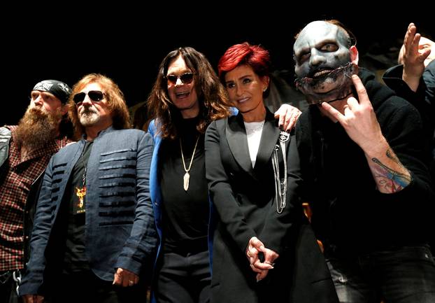 FILE PHOTO: Osbourne and his wife pose with Butler of Black Sabbath, Wylde and Slipknot member Taylor at a news conference in Los Angeles