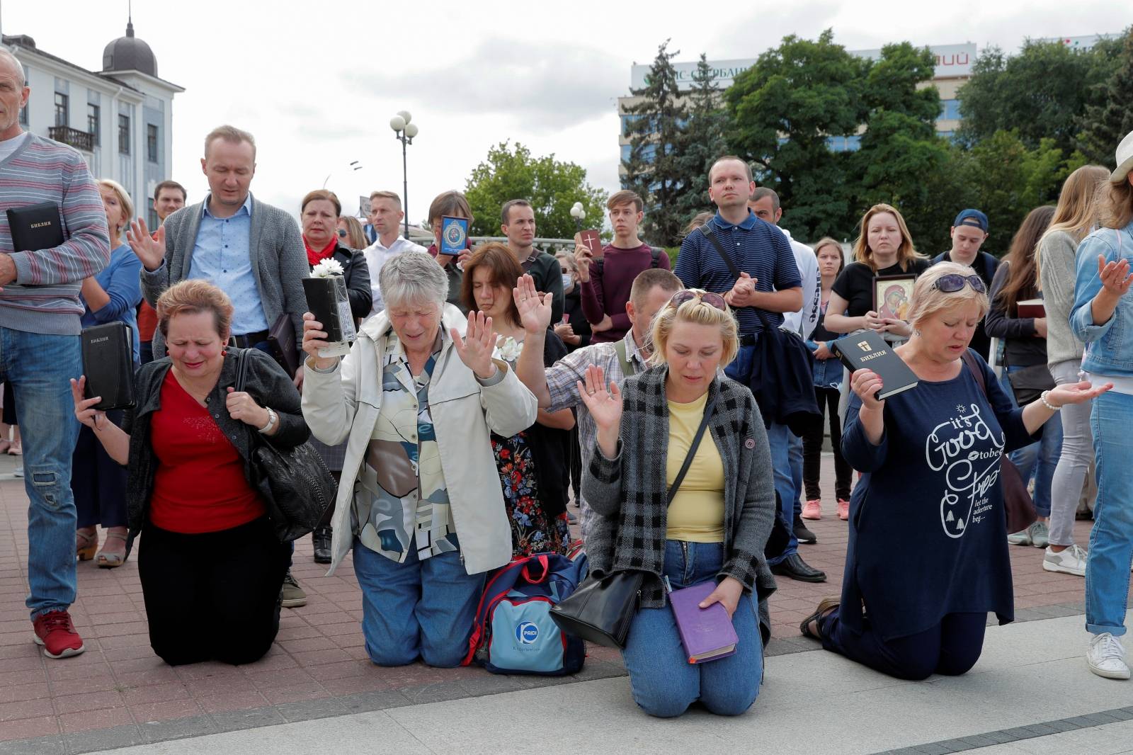 Believers take part in a religious procession against violence in Minsk