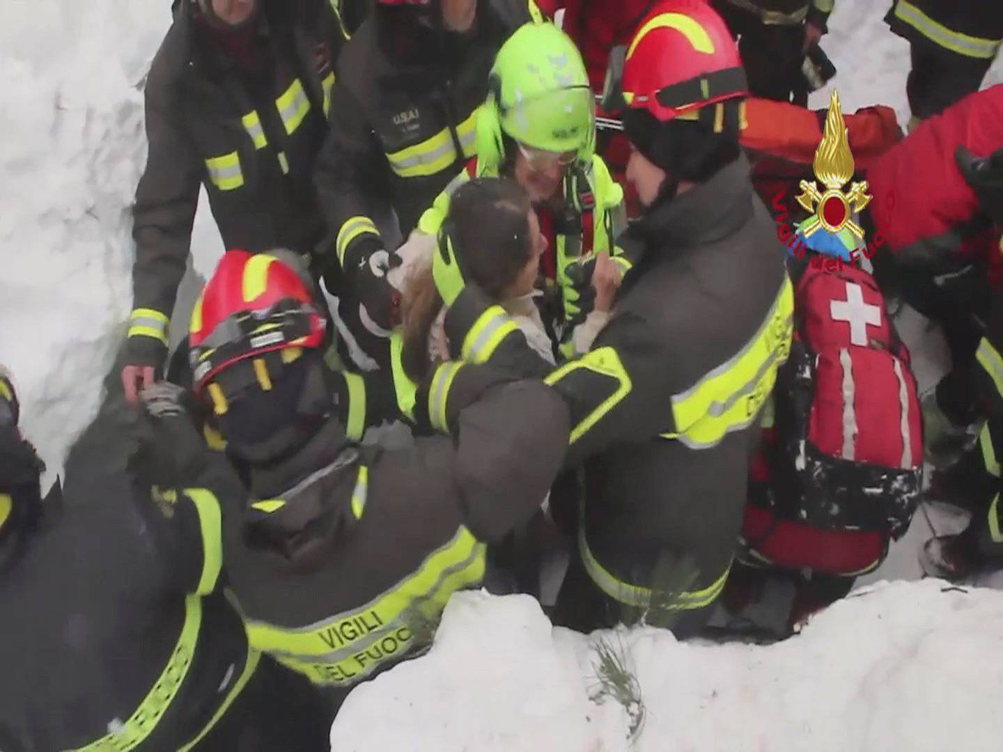 Firefighters rescue a survivor from Hotel Rigopiano in Farindola