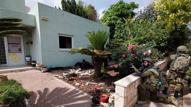 Israeli army secures kibbutz Kfar Aza after massacre of civilians by Hamas