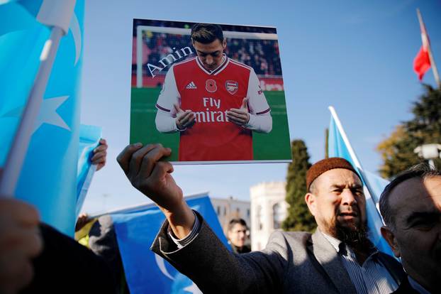 Ethnic Uighur demonstrators attend a protest against China in Istanbul