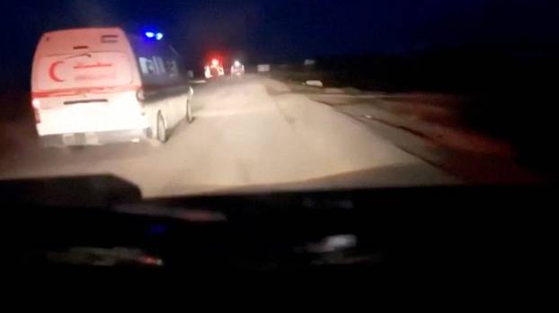 Screenshot from a video published by the Palestinian Red Crescent shows the last moments during the incident in which aid workers were killed in Israeli fire in the southern Gaza Strip