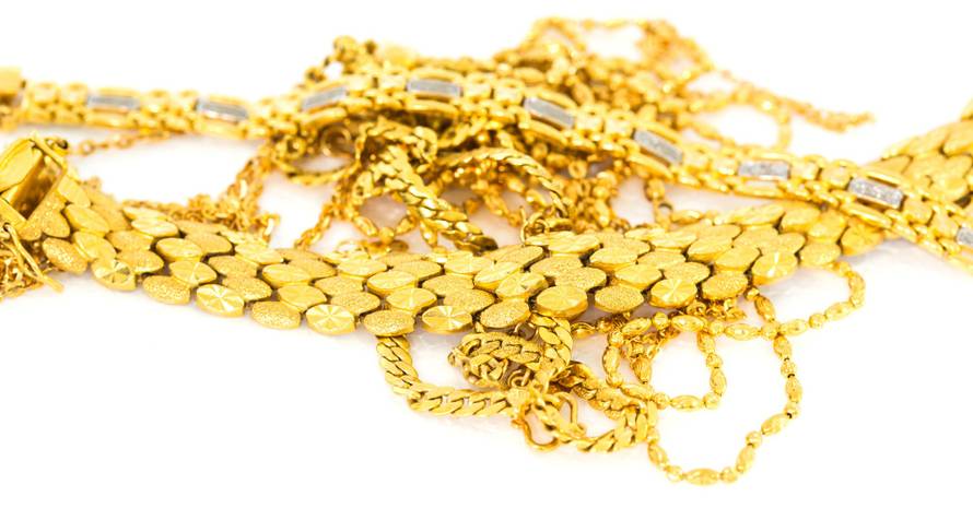 A,Bunch,Of,Gold,Bracelets,And,Necklaces