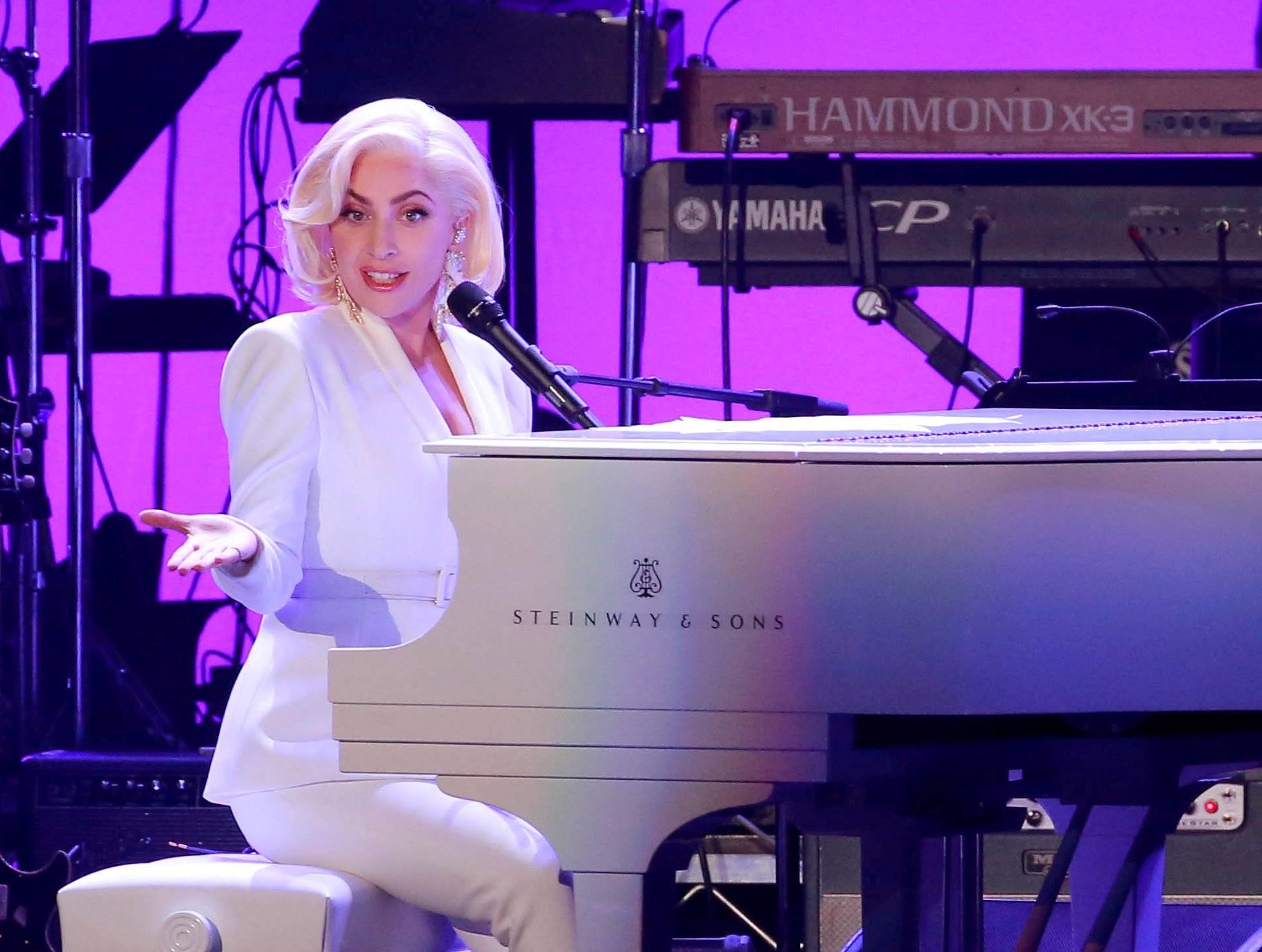FILE PHOTO: Lady Gaga performs for the five former U.S. presidents, Jimmy Carter, George H.W. Bush, Bill Clinton, George W. Bush, and Barack Obama during a concert at Texas A&M University benefiting hurricane relief efforts in College Station