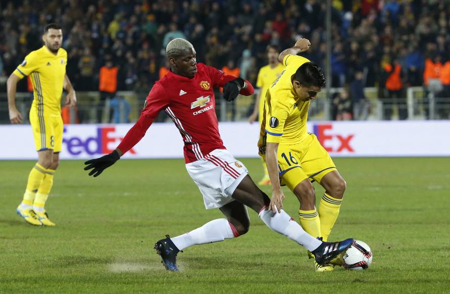 FC Rostov's Christian Noboa in action with Manchester United's Paul Pogba