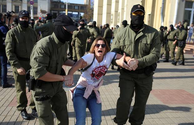 Belarusian opposition supporters hold a rally in Minsk