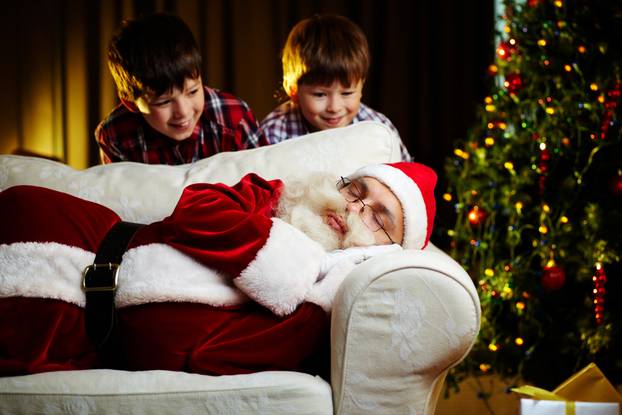 Photo,Of,Santa,Claus,Sleeping,On,Sofa,With,Two,Happy