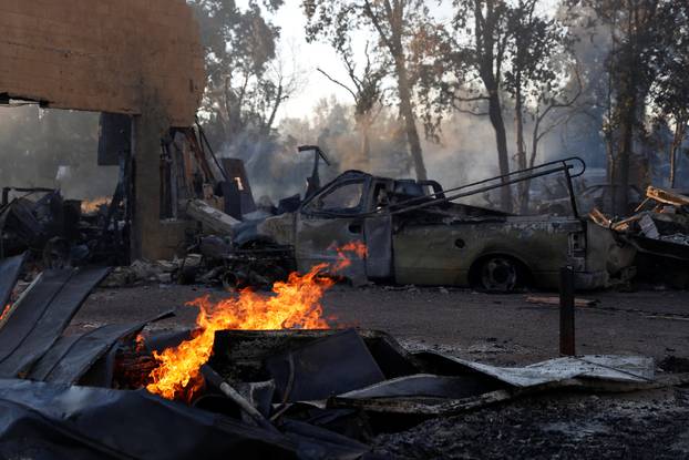 Property destroyed by the Clayton Fire is seen near downtown Lower Lake, California