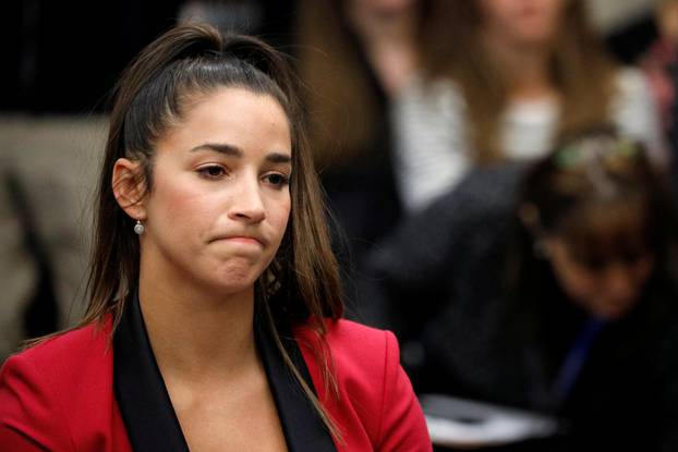 Victim and Olympic gold medalist Aly Raisman appears before speaking at the sentencing hearing for Larry Nassar, a former team USA Gymnastics doctor who pleaded guilty in November 2017 to sexual assault charges, in Lansing