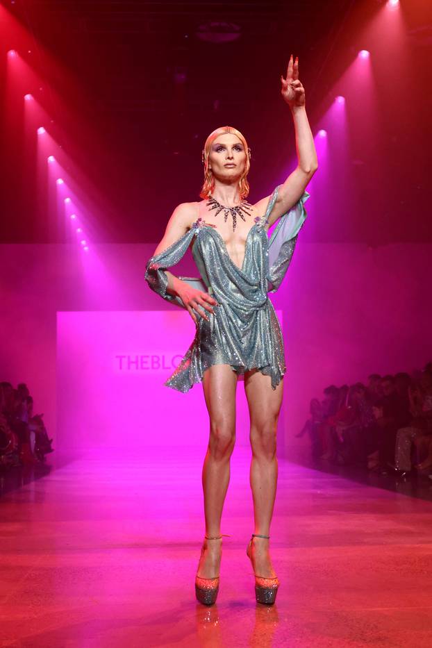 Dylan Mulvaney models a creation from The Blonds as they present their latest collection during New York Fashion Week in New York City