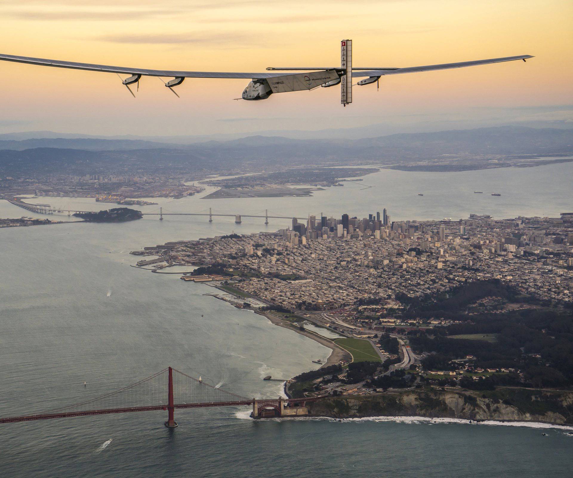 "Solar Impulse 2", a solar-powered plane piloted by Bertrand Piccard of Switzerland, flies over the Golden Gate bridge in San Francisco