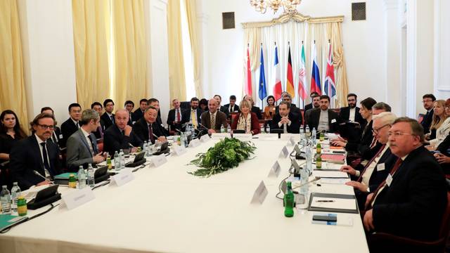 Iran's top nuclear negotiator Araqchi and EEAS Schmit attend a meeting in Vienna