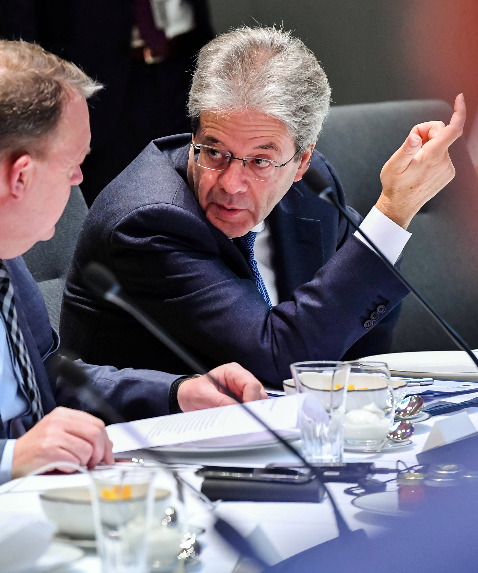 Denmark's PM Rasmussen and Italy's PM Gentiloni attend a EU leaders summit in Brussels