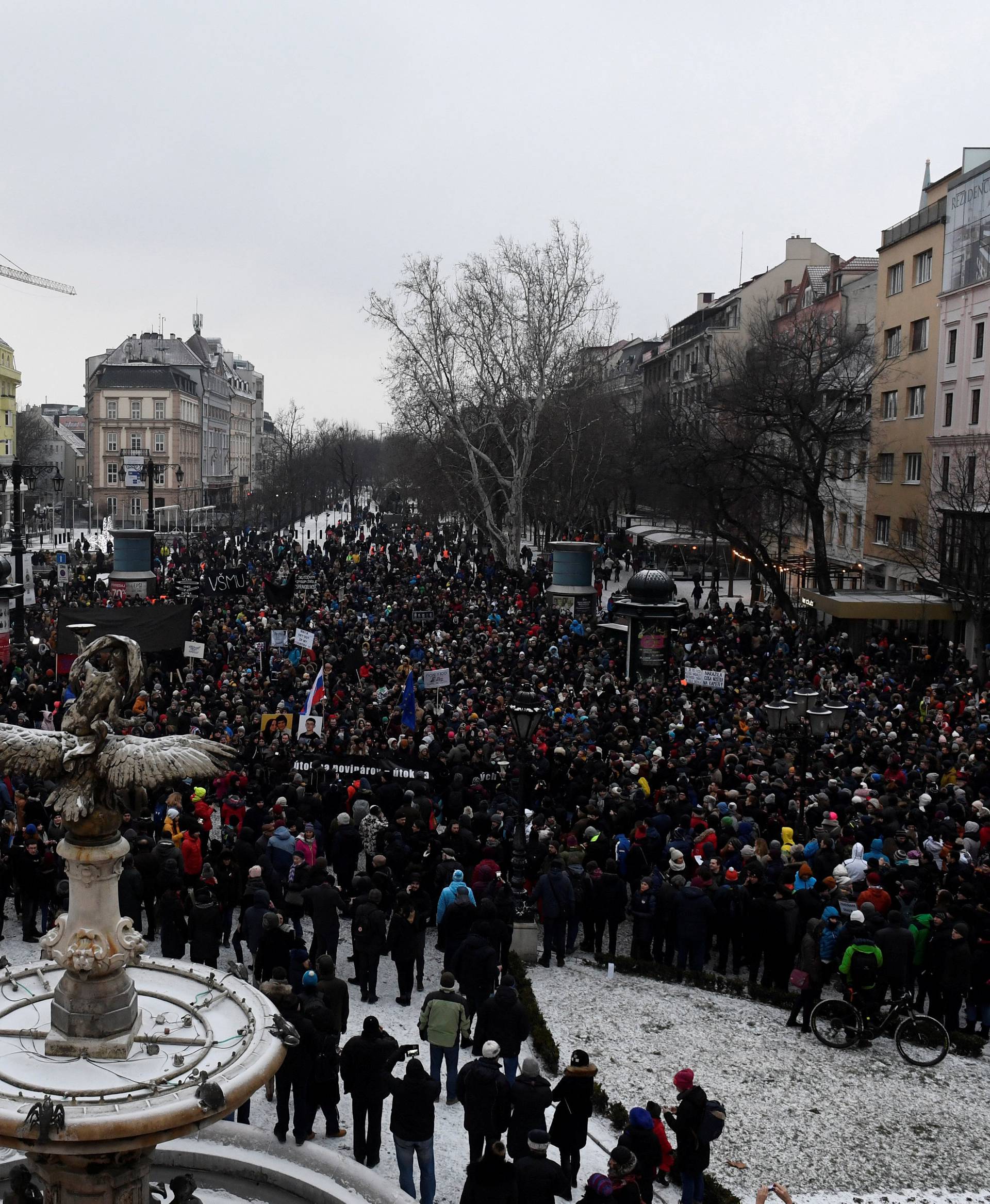 Participants march in honour of murdered Slovak investigative reporter Jan Kuciak in Bratislava