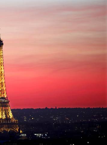 FILE PHOTO: The Eiffel Tower is seen at sunset in Paris