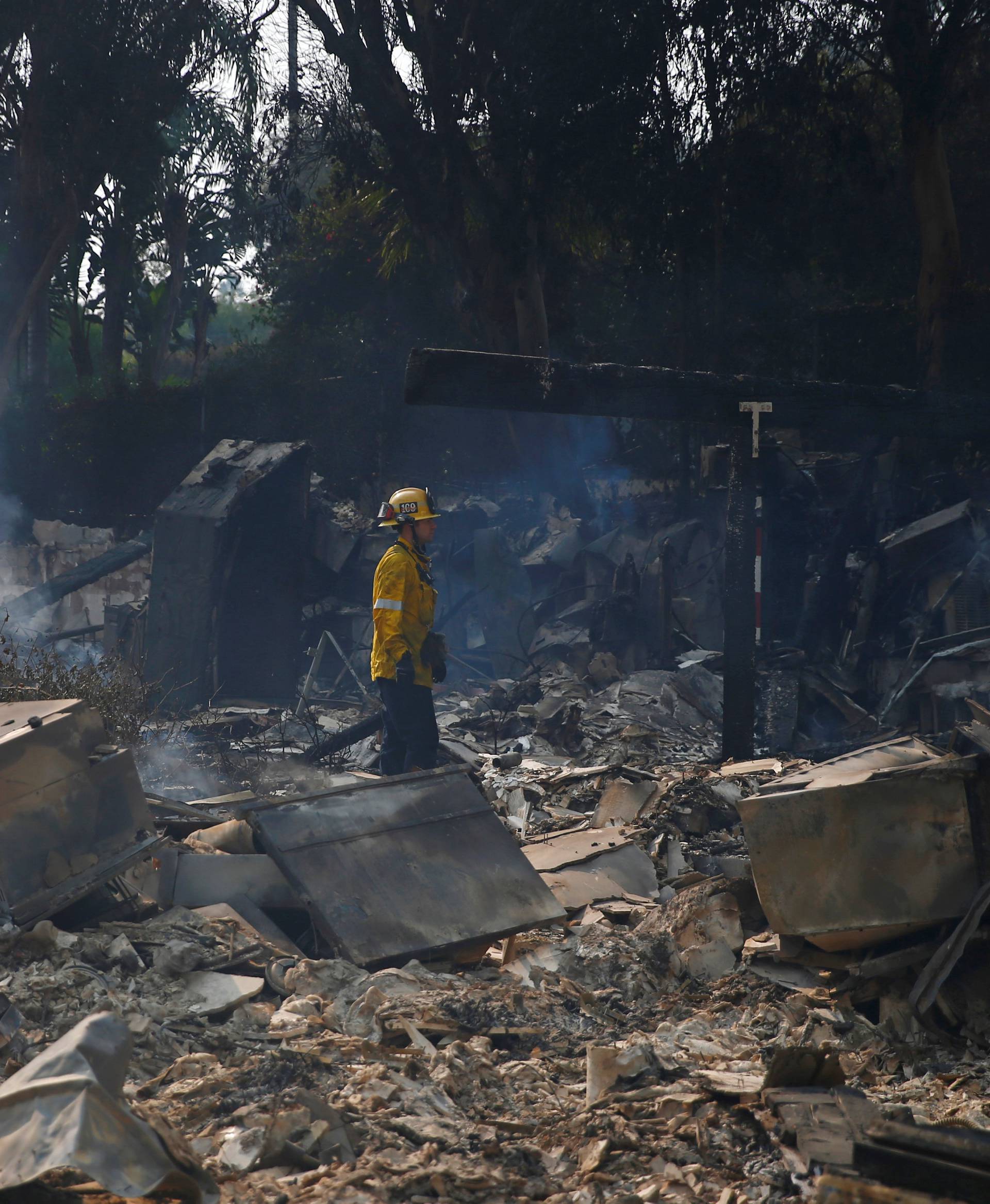 A destroyed home is seen as the Woolsey Fire continues to burn in Malibu