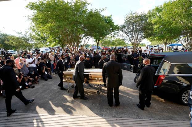 The casket of George Floyd is removed after a public visitation for Floyd