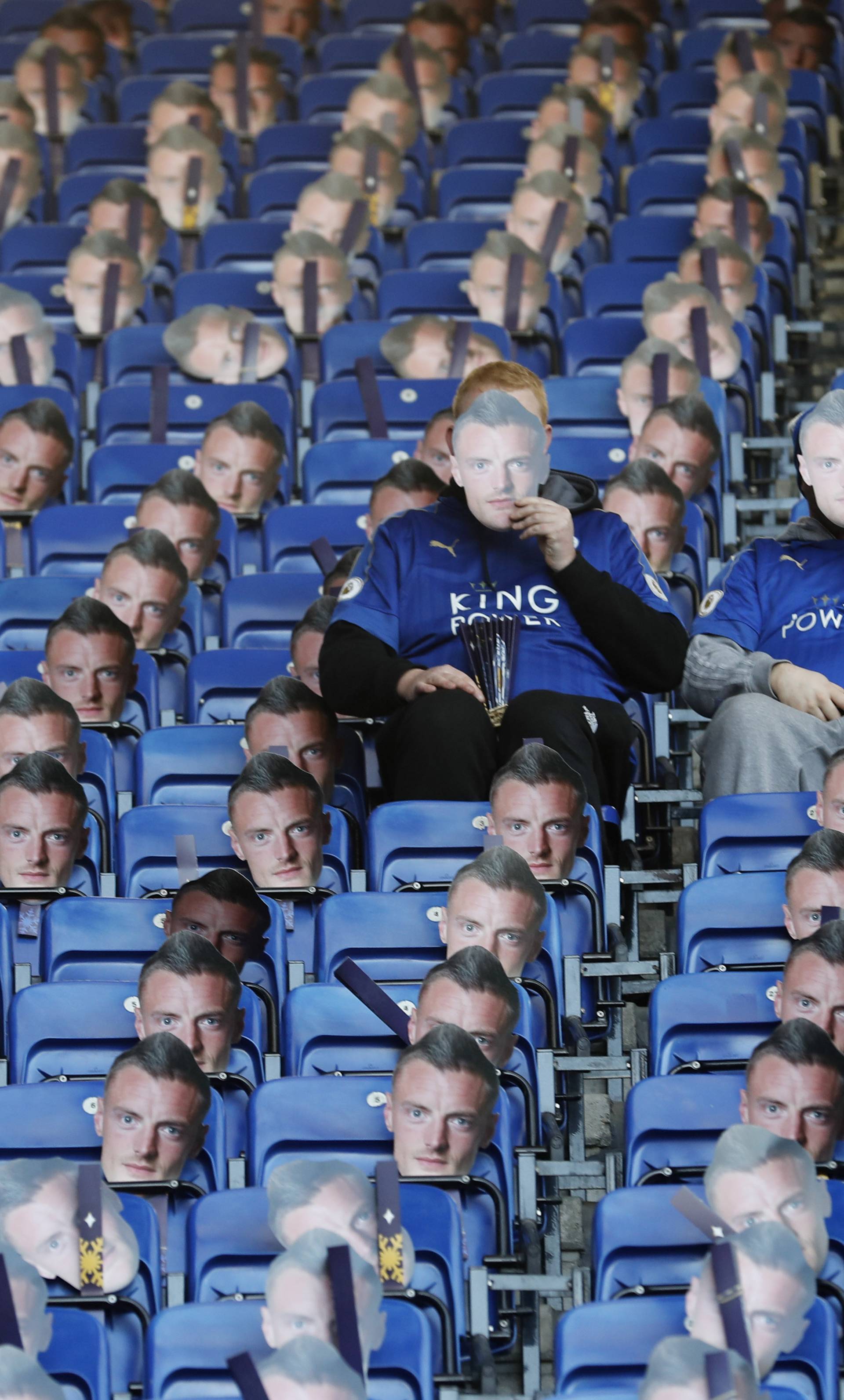 General view of Leicester City fans with Jamie Vardy masks before the match