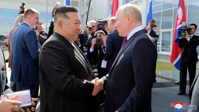 FILE PHOTO: FILE PHOTO: North Korean leader Kim Jong Un meets Russia's President Vladimir Putin