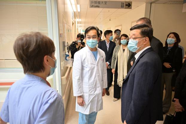 Hong Kong Chief Executive John Lee visits injured persons after deadly fire in Hong Kong
