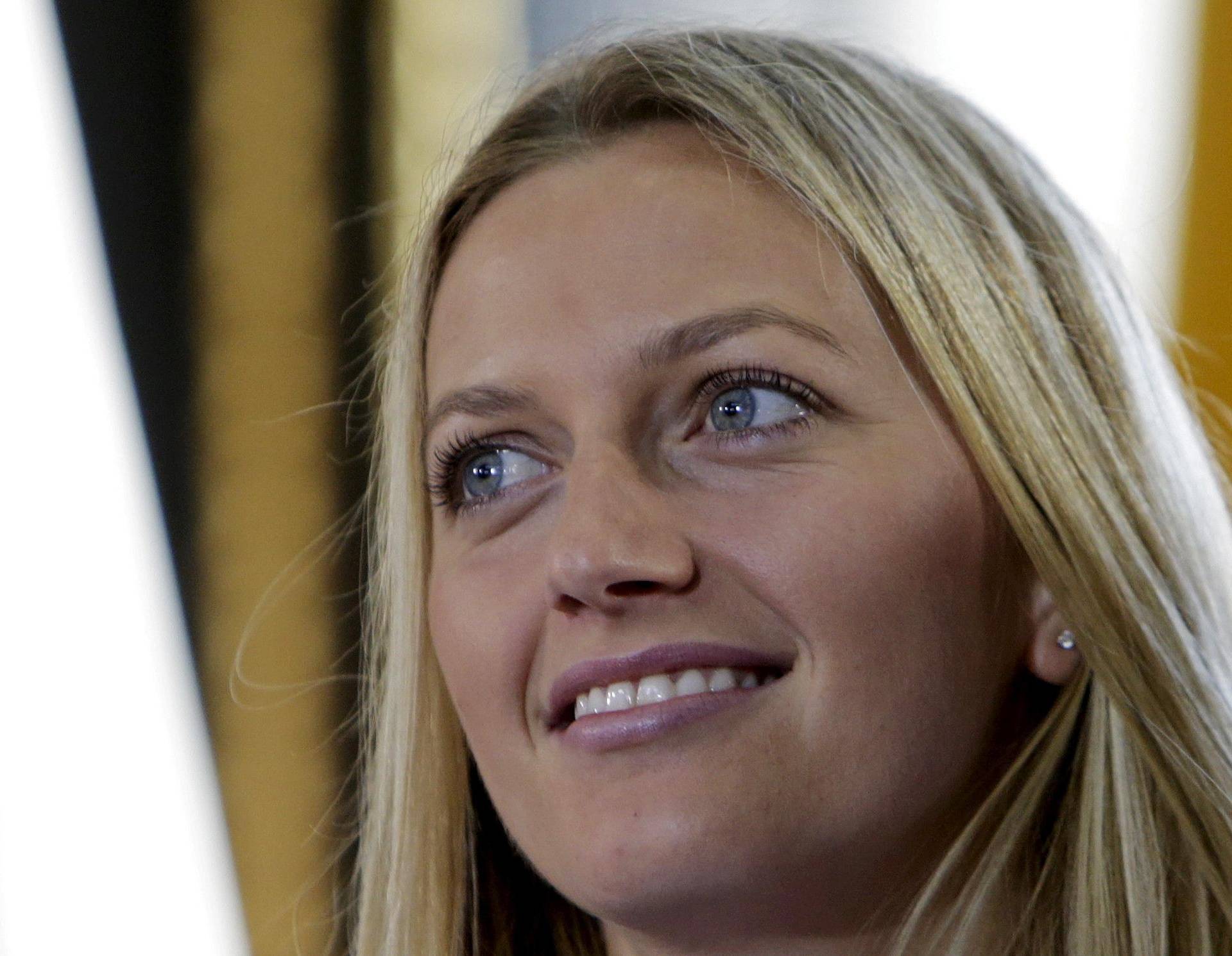 FILE PHOTO: Czech Republic's Petra Kvitova smiles during the draw for the Fed Cup final in Prague