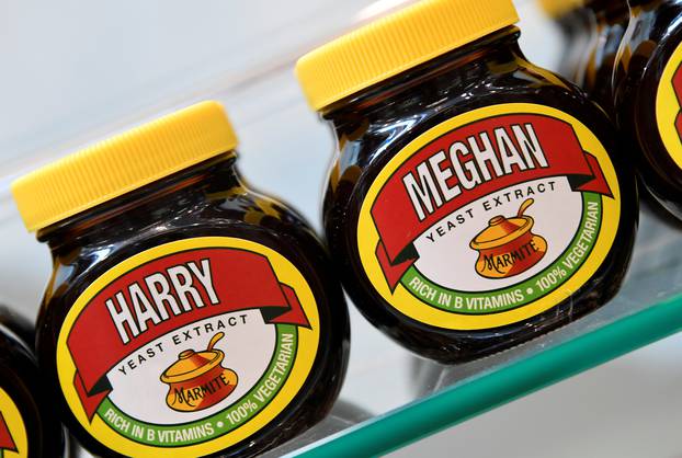 A shelf display of Marmite spread with a redesigned label for the forthcoming wedding of Britain