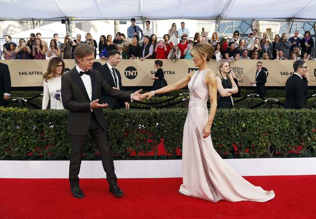 William H. Macy and Felicity Huffman arrive at the 23rd Screen Actors Guild Awards in Los Angeles