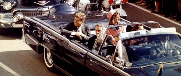 FILE PHOTO: U.S. President John F. Kennedy, First Lady Jaqueline Kennedy and Texas Governor John Connally ride  in a liousine moments before Kennedy was assassinated, in Dallas