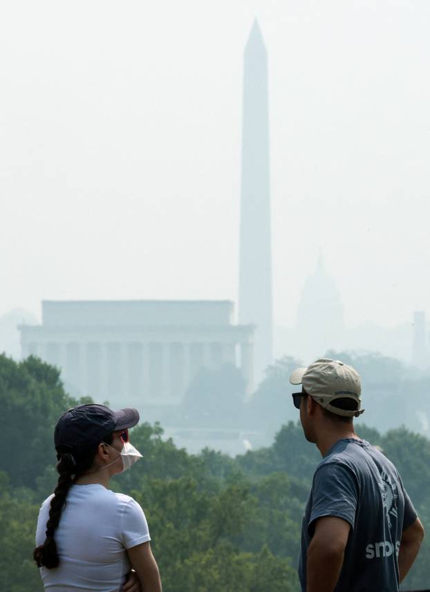 Smoke from Canadian wildfires clouds the National Mall and monuments in Washington