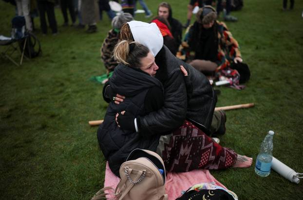Winter solstice celebrations during sunrise at Stonehenge