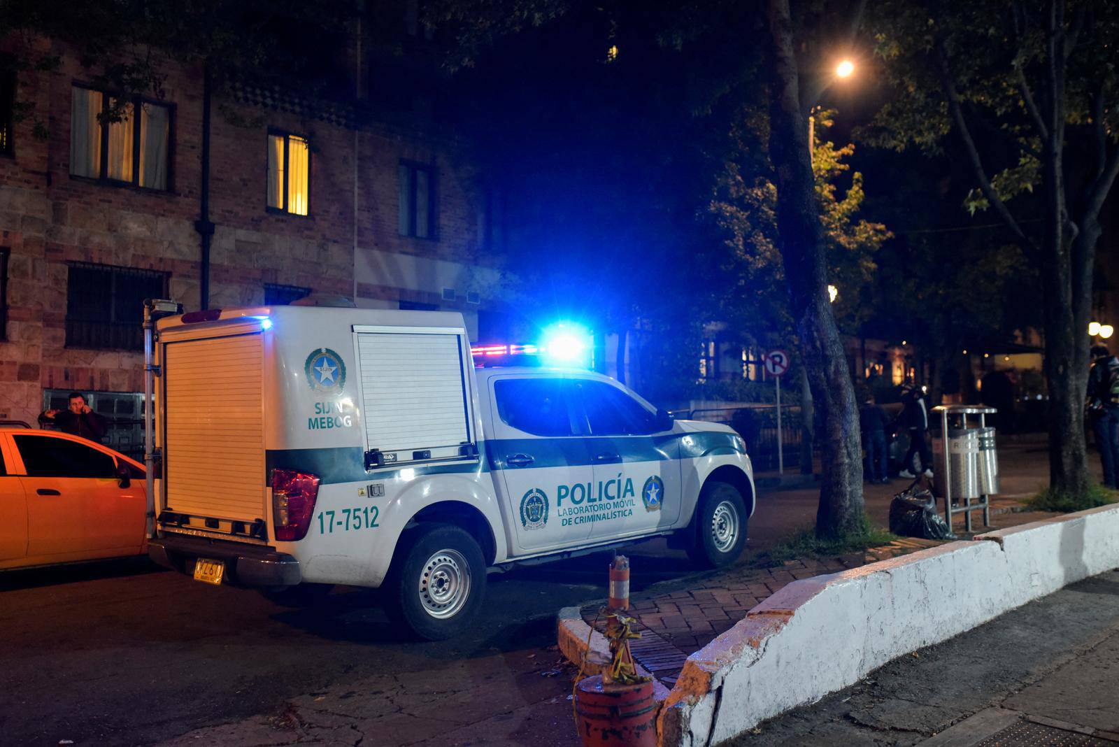 A police van is seen outside the Casa Medina hotel, where Taylor Hawkins, drummer of the band Foo Fighters was staying, who died hours before his presentation at the Estereo Picnic festival, in Bogota