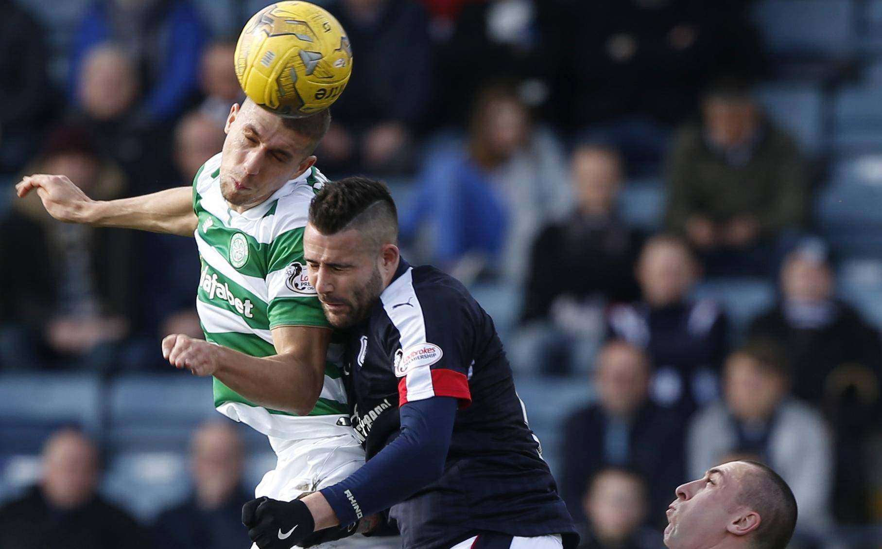 Celtic's Jozo Simunovic in action with Dundee's Marcus Haber