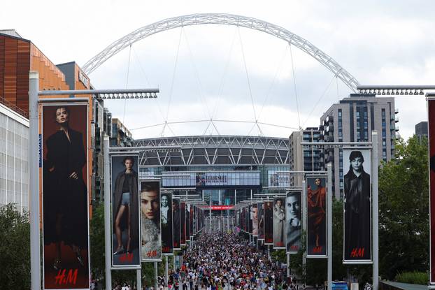 Fans gather for Taylor Swift's concert at Wembley Stadium, in London