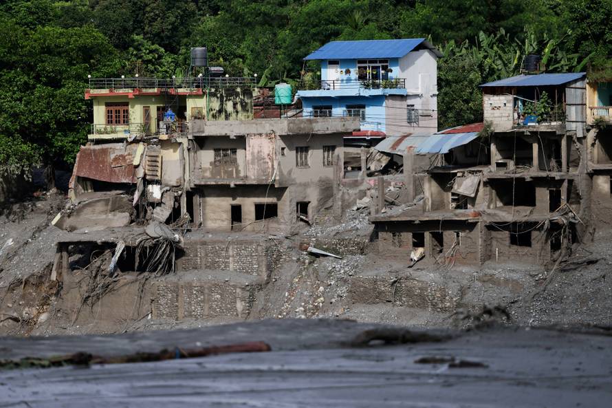 Damaged houses following devastating floods, in Trishuli