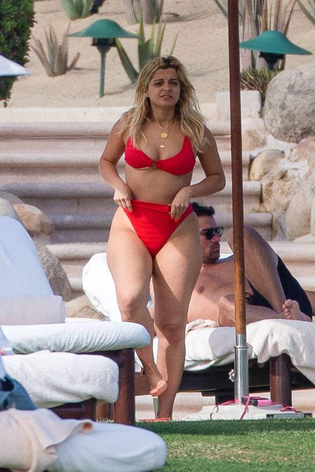 *PREMIUM-EXCLUSIVE* Bebe Rexha shows off her curves in a red bikini while soaking up the sun in Cabo