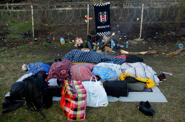 Migrants sleep near Turkey