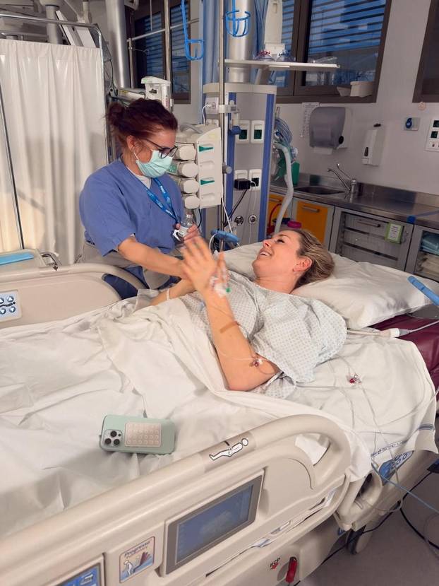 U.S. skier Lindsey Vonn lies in a hospital bed, after she crashed during the Women's Downhill, in Treviso