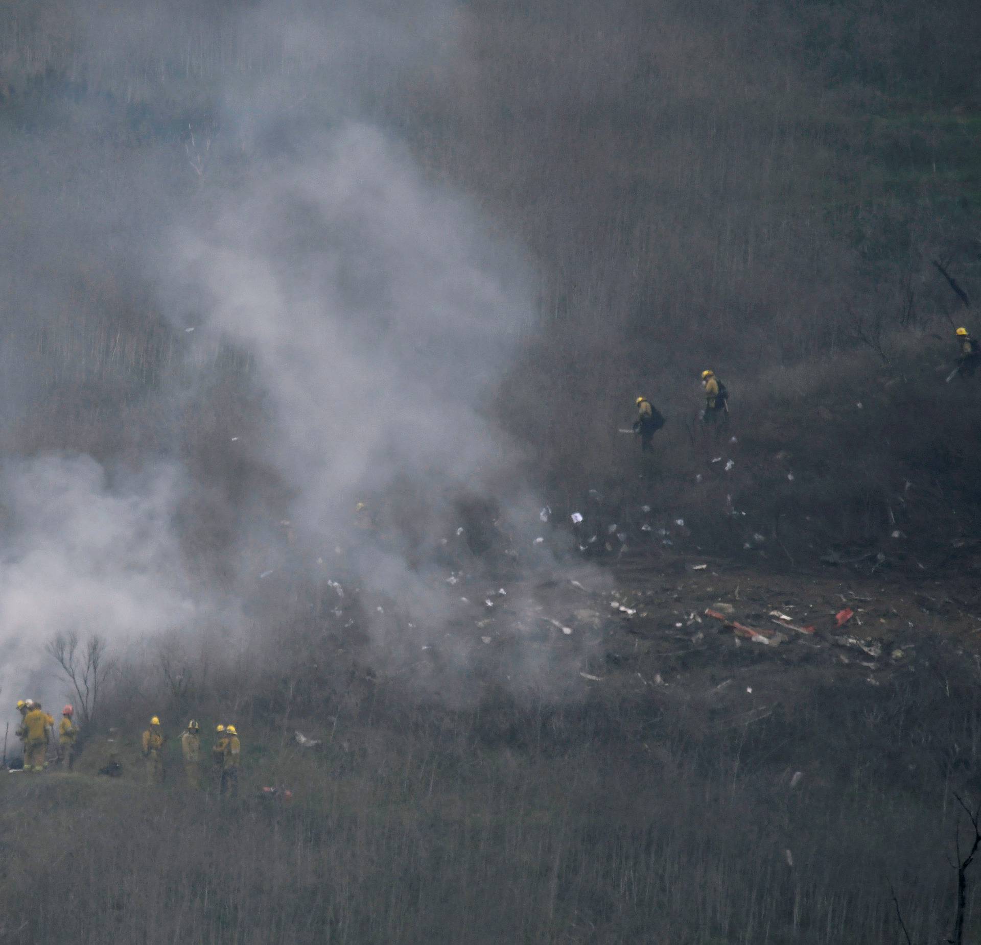 LA county firefighters on the scene of a helicopter crash that reportedly killed Kobe Bryant in Calabasas