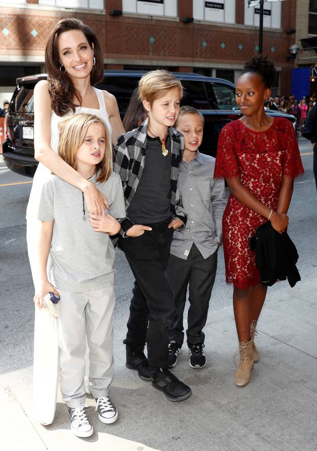 Jolie arrives on the red carpet with her children for the film "The Breadwinner" during the Toronto International Film Festival in Toronto