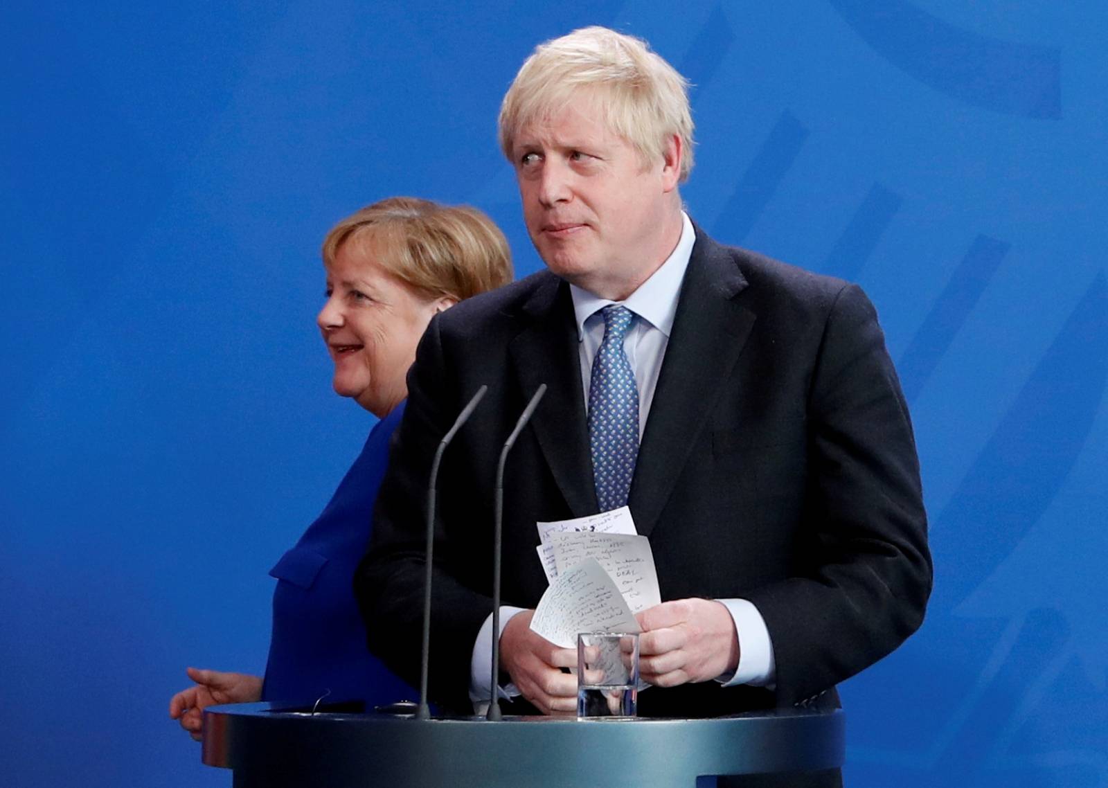 FILE PHOTO: German Chancellor Merkel meets Britain's Prime Minister Johnson at the Chancellery in Berlin