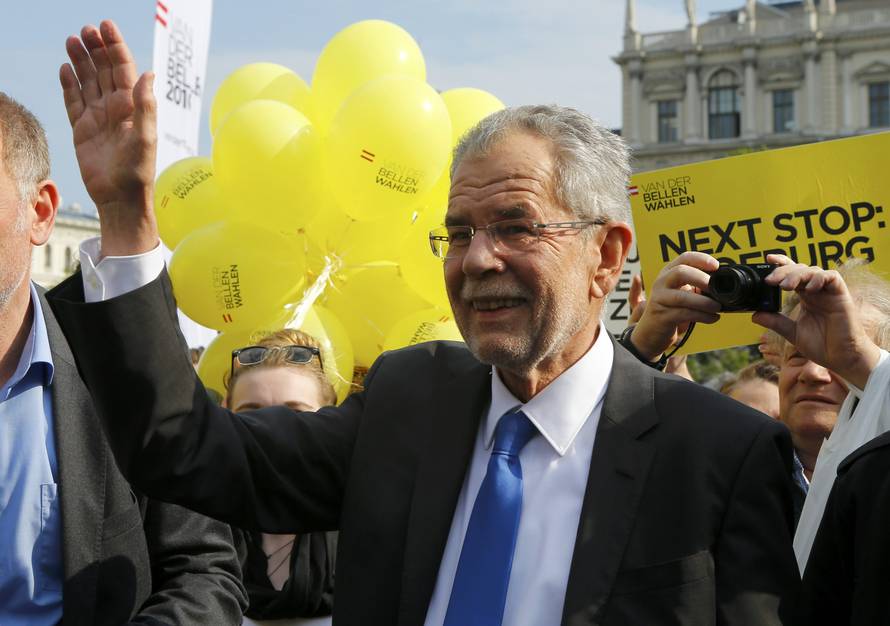 Van der Bellen who is supported by the Greens party arrives for his final election rally ahead of Austrian presidential election in Vienna