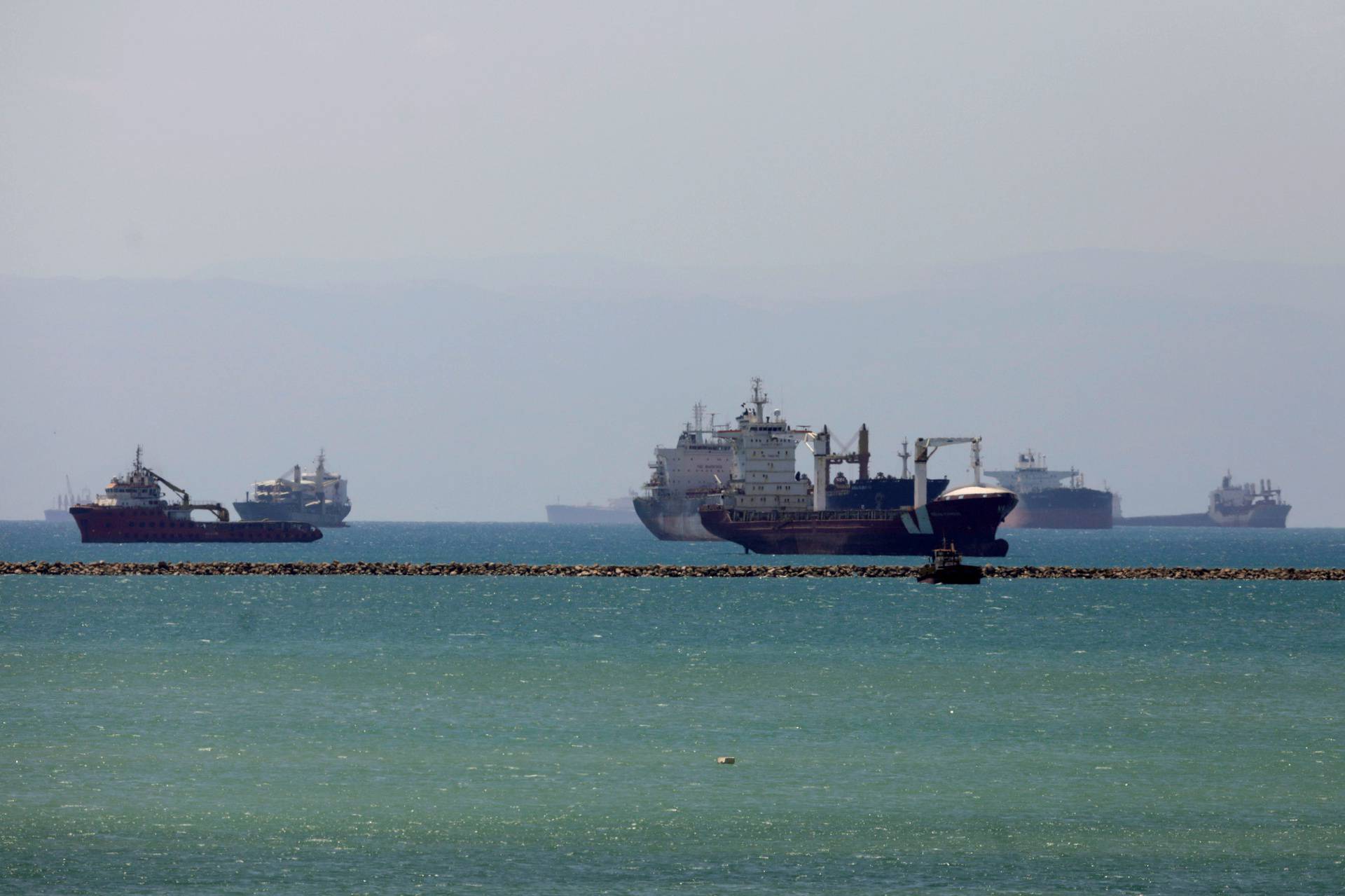 Ships are anchored at the entrance of Suez Canal, in Suez