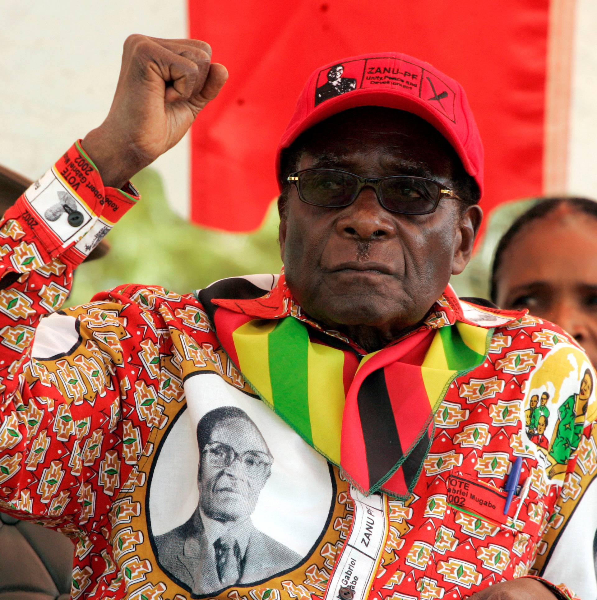 FILE PHOTO -  File photo of Zimbabwe's President Robert Mugabe gesturing at an election rally in the small town of Shamva