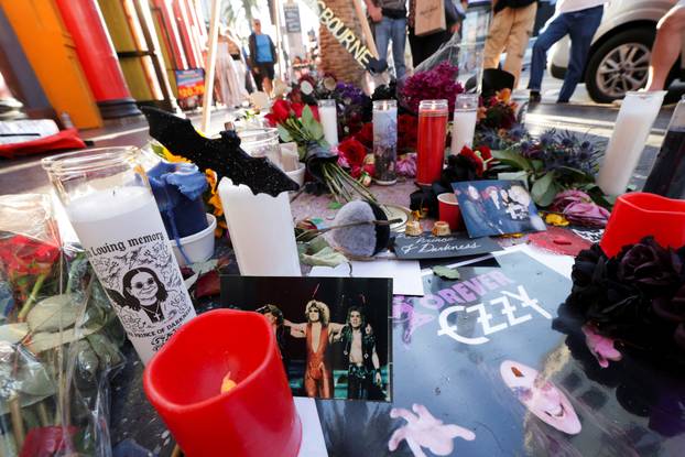 Flowers and pictures are placed on the star of late Ozzy Osbourne at the Hollywood Walk of Fame in Los Angeles