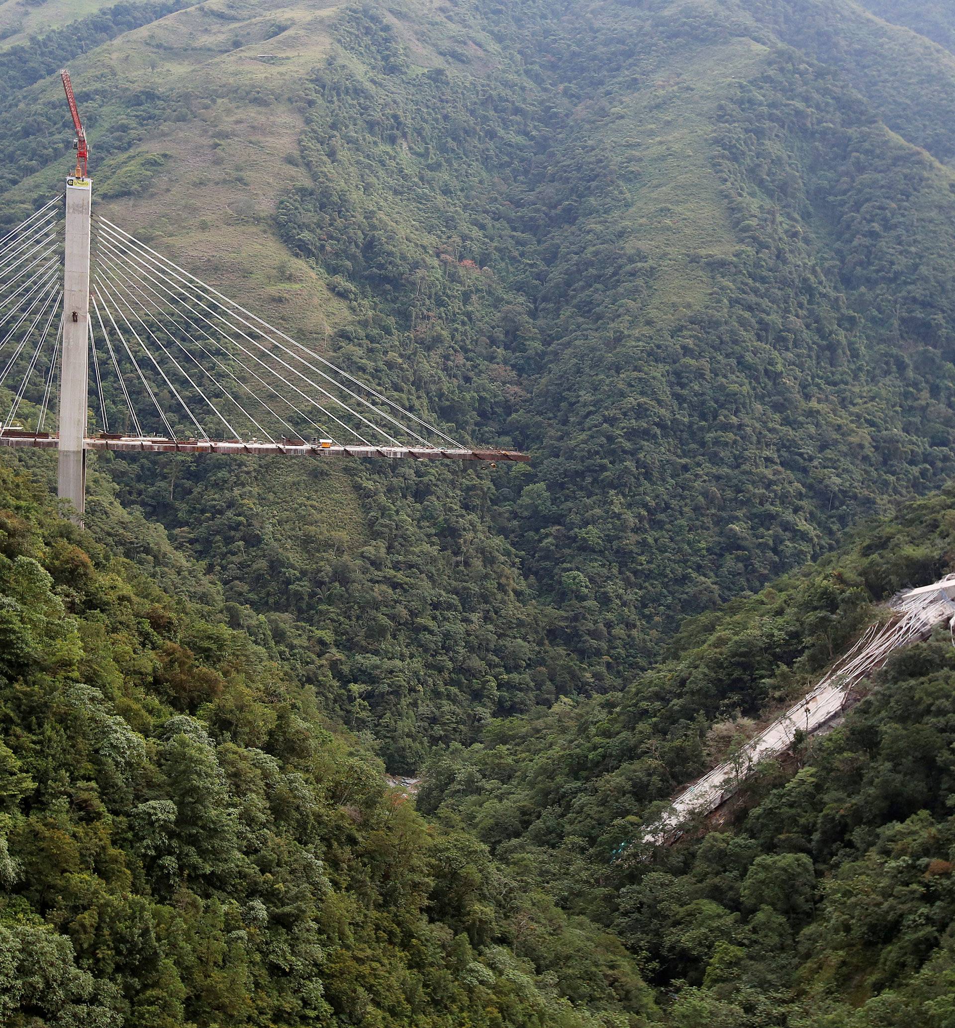 View of a bridge under construction that collapsed leaving dead and injured workers in Chirajara near Bogota