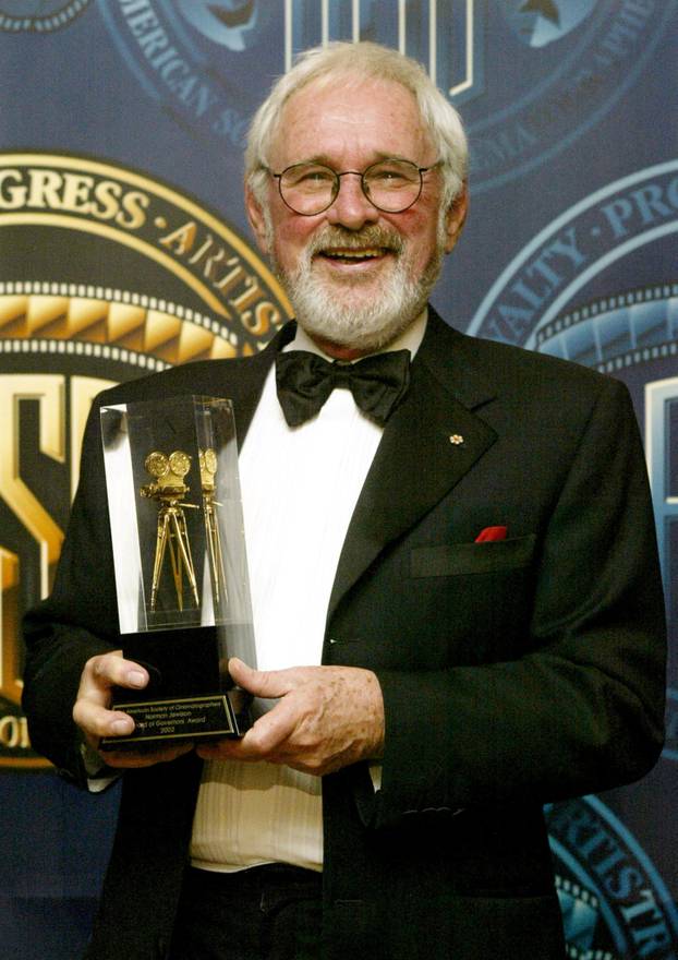 FILE PHOTO: DIRECTOR NORMAN JEWISON HOLDS BOARD OF GOVERNORS AWARD AT ASC AWARDS.