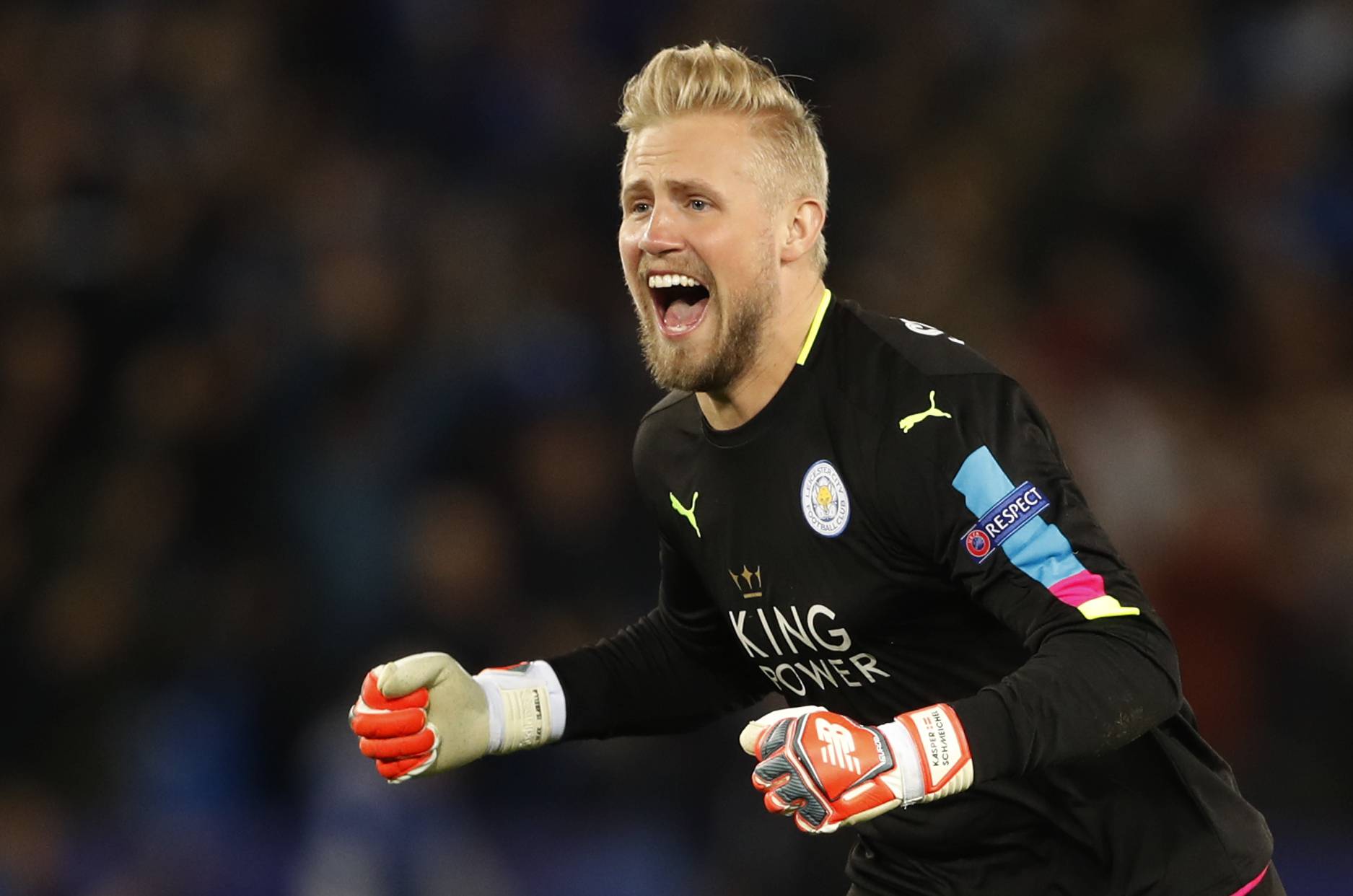 Leicester City's Kasper Schmeichel celebrates after Wes Morgan scores their first goal