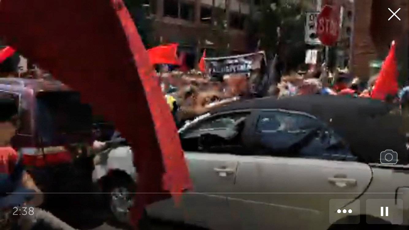 Vehicle is seen plowing into the crowd gathered on a street in Charlottesville